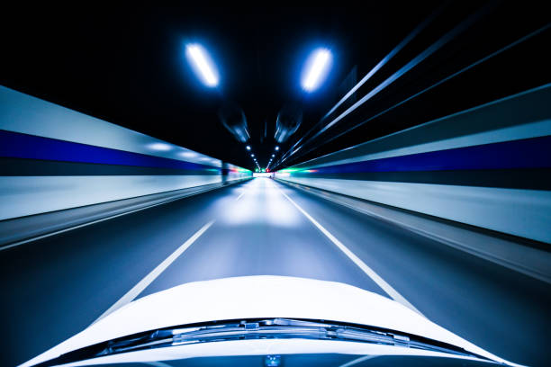 istock Car through a road tunnel 924399088
