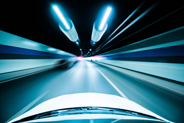 istock Car through a road tunnel 924399140