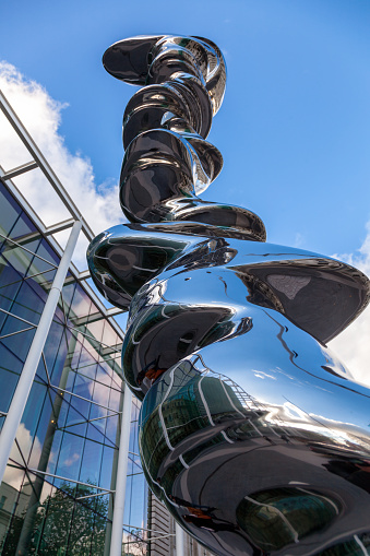 LONDON, UK - NOVEMBER 03, 2012:  Sir Anthony Douglas Cragg's stainless steel outdoor sculpture Elliptical Column on display at the Exhibition Road in London