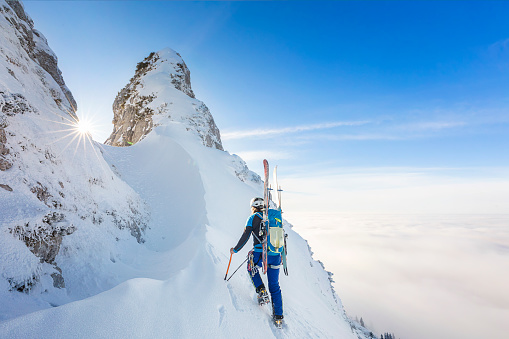 Cross country skiier - Freerider at the way to Summit - Mount Kampenwand, Alps