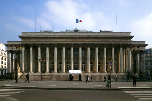 Paris, France - February 21 2018: The Bourse de Paris (English: Paris Bourse) is the historical Paris stock exchange, known as Euronext Paris from 2000 onwards. The building, known as the Palais Brongniart, is located in the Place de la Bourse, in the II arrondissement, Paris.