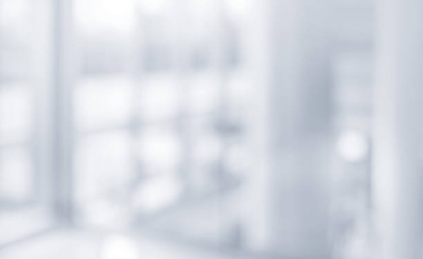 istock Blurred abstract  grey glass wall building background. 924418840