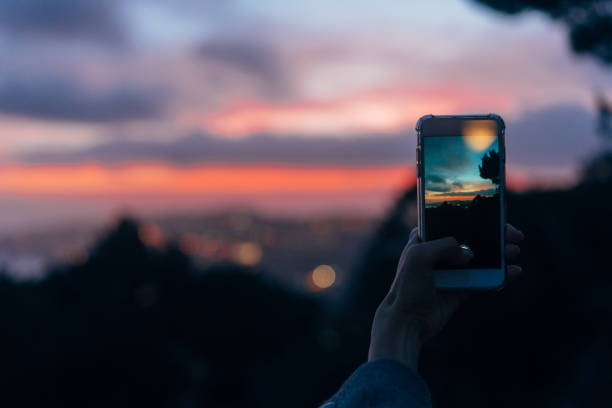 istock Young woman taking photo 924419230