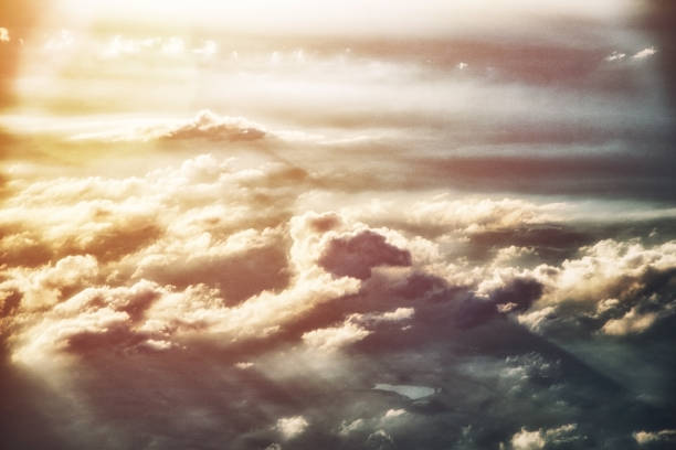 istock Clouds and sky as seen through window of an aircraft 924419738