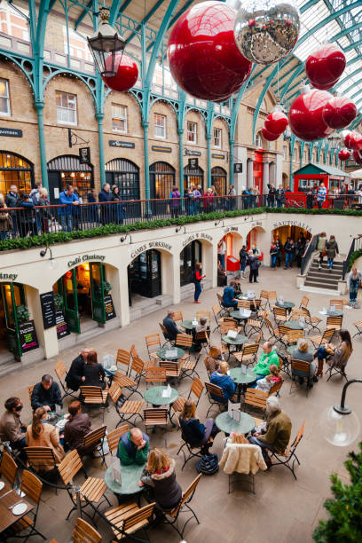 LONDON, UK - OCT 31, 2012: Visitors at Covent Garden Market, one of the main tourist attractions in London