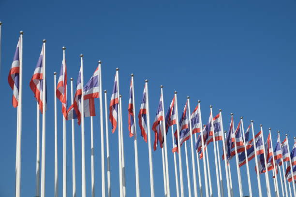 istock thailand flag on blue sky background 924423136