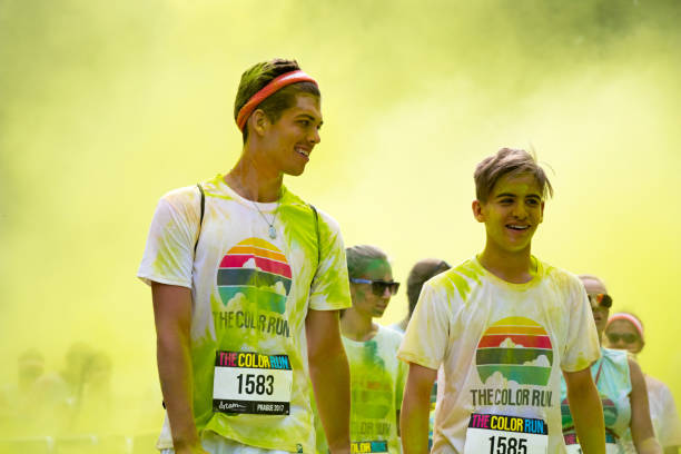 Prague, Czech Republic - June 3, 2017: Teenage boys participating in the Color Run (a fun race) in Prague