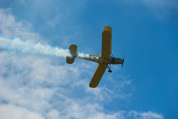 istock Vintage single engine propeller biplane aircraft flying against sky 924425896