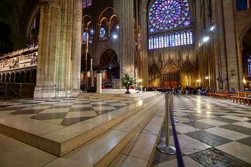 Paris, France- circa May, 2017: Gothic interior of the Notre Dame de Paris Cathedral on May, 2017 in Paris. The cathedral of Notre Dame is one of the top tourist destinations in Paris