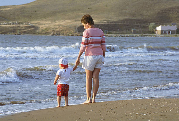 istock Mother and child on a beach 92443649