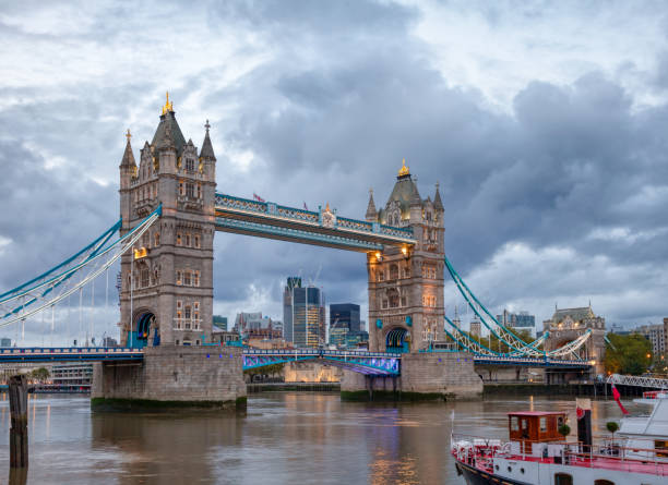 istock London cityscape with illuminated Tower Bridge over the River Thames 924436818