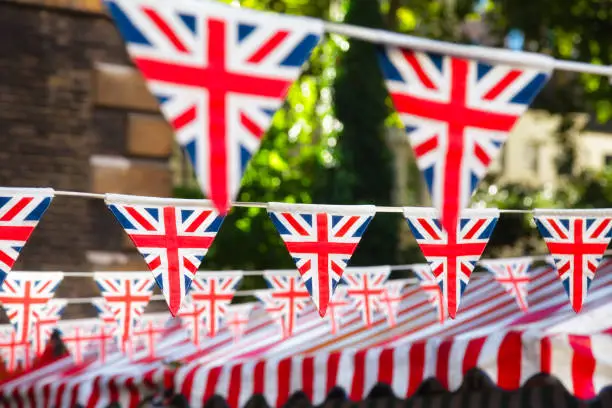 Photo of Strings of Union Jack bunts festive decoration in London England UK