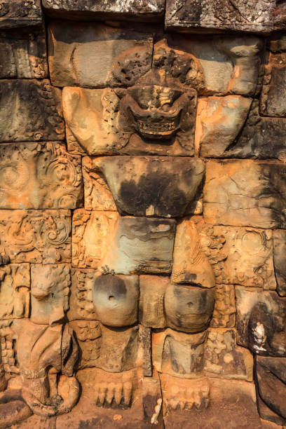 istock Yaksha demon image in stone wall in Cambodia 924437462