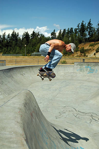 istock Skateboarding - Backside Air into the bowl 92443940