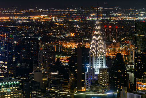 Aerial nightview of the buildings and skyscrapers of Manhattan illuminated