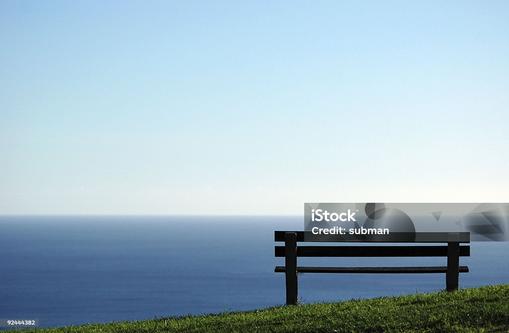 Atlantic View Ocean views in the background, with a resting bench in the foreground. Atlantic Ocean Stock Photo