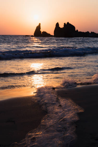 istock beautiful sunset to end the day at the beach 924450492