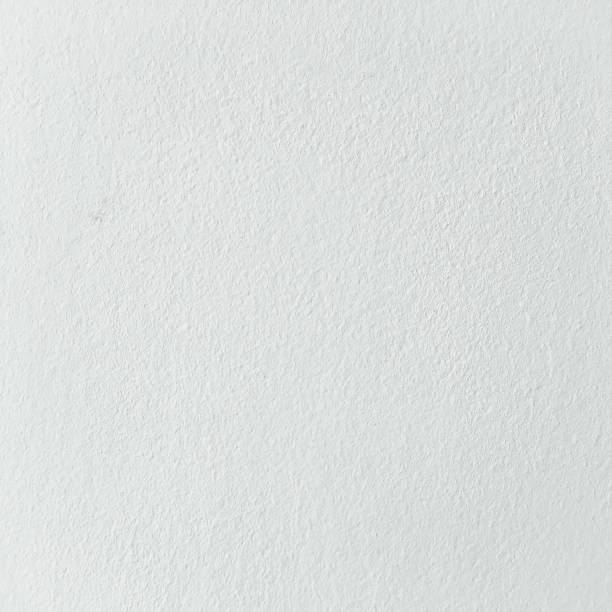 istock Grungy painted wall texture as background. Cracked concrete vintage wall background, old white painted wall. Background washed painting. 924451148