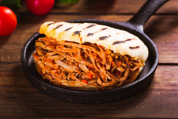 istock Freshly cooked Arepa with roasted meat 924454492