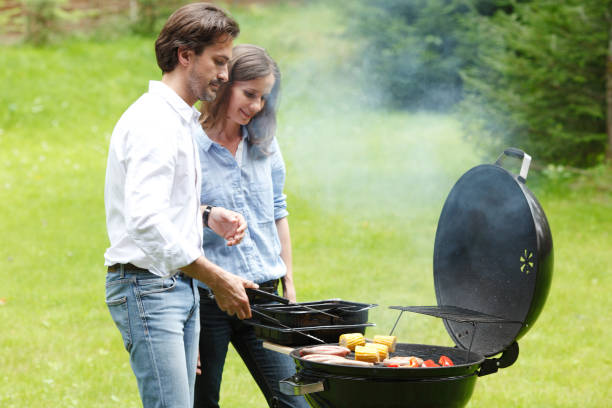 istock Couple cooking on barbecue 924455040