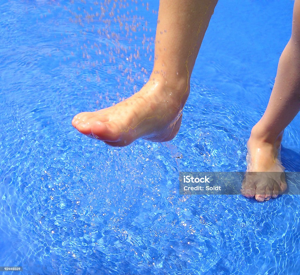 wet feet  Bathtub Stock Photo