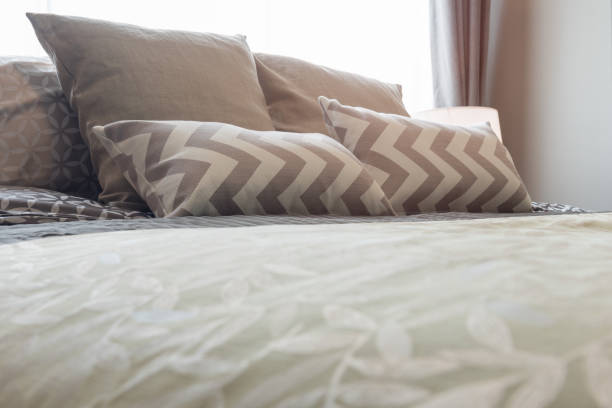istock cozy bedroom with set of pillows 924456094