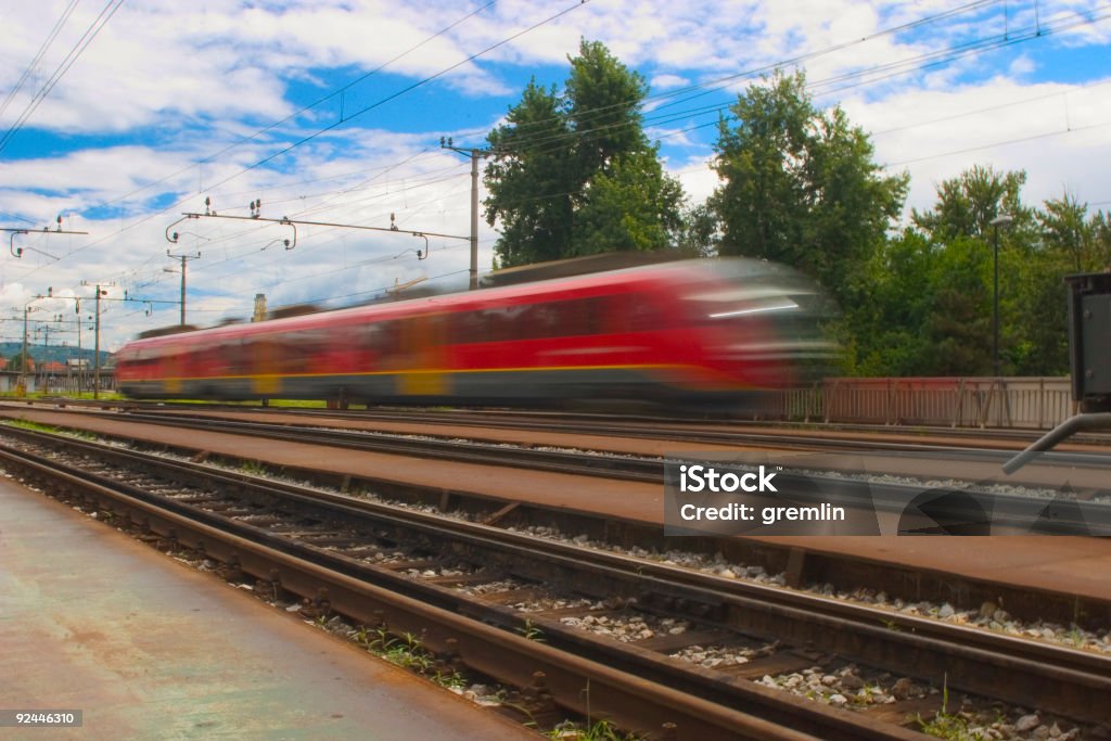 Speeding train A small speeding train. Blurred Motion Stock Photo