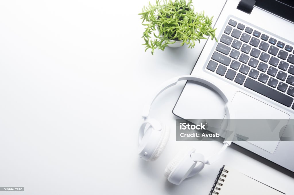 Office desk table with supplies. Flat lay Business workplace and objects. Top view. Copy space for text Office desk table with supplies. Flat lay Business workplace and objects. Top view. Copy space for text. Headphones Stock Photo