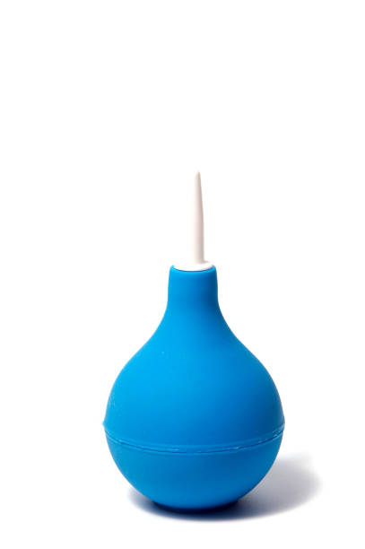 istock blue enema ot syringe bulb. Isolated on white background 924469294