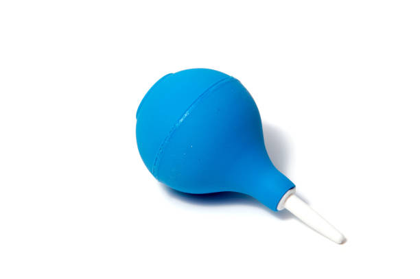 istock blue enema ot syringe bulb. Isolated on white background 924469332