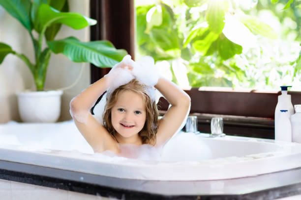 istock Child in bubble bath. Kid bathing. Baby in shower. 924469694