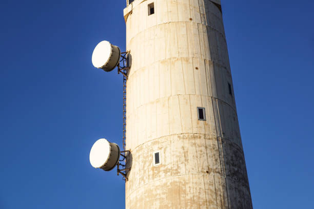istock Microwave antenna on the wall of building. 924475680