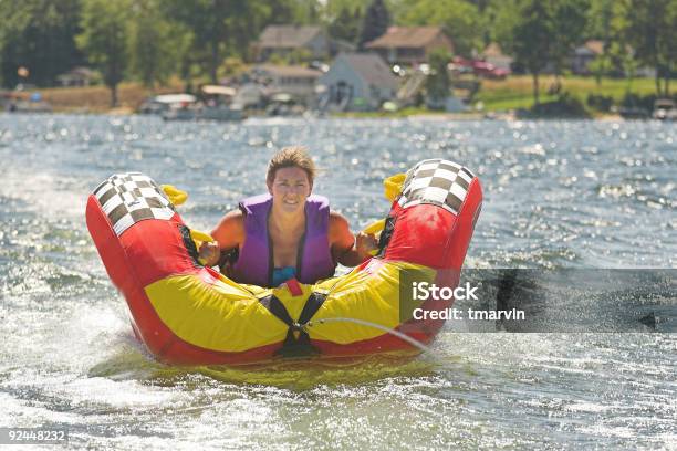 Foto de Tocando No Lago e mais fotos de stock de Boia - Inflável - Boia - Inflável, Divertimento, Exterior