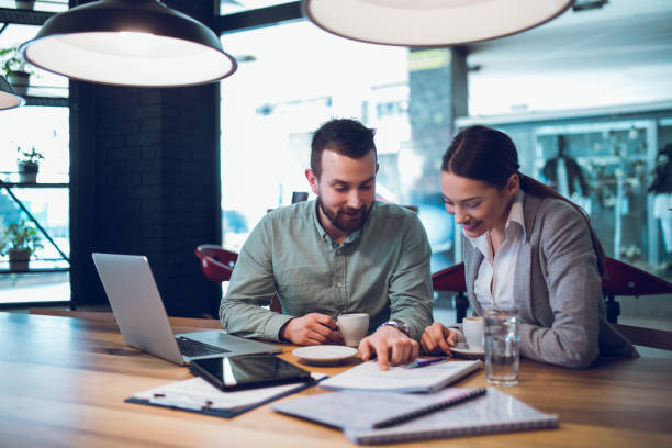 istock Two creative business partners discussing new business ideas 924486010