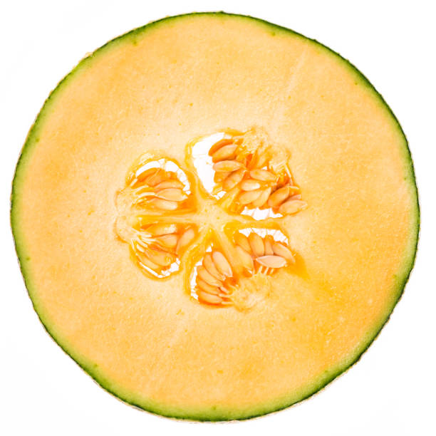 slice of real edible melon isolated on white background, no artificial ingredients used