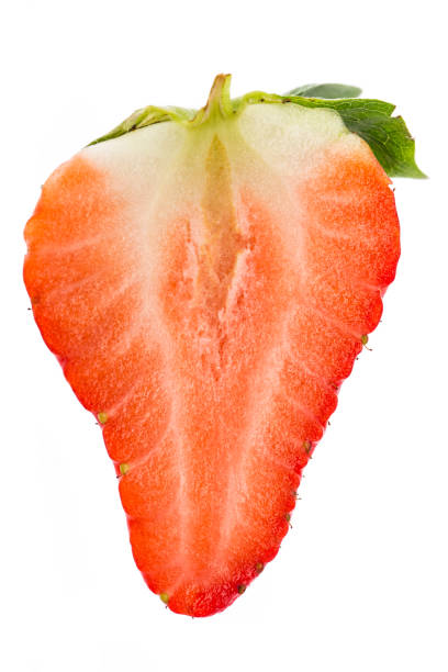 istock Slice of a strawberry isolated on white background 924490232