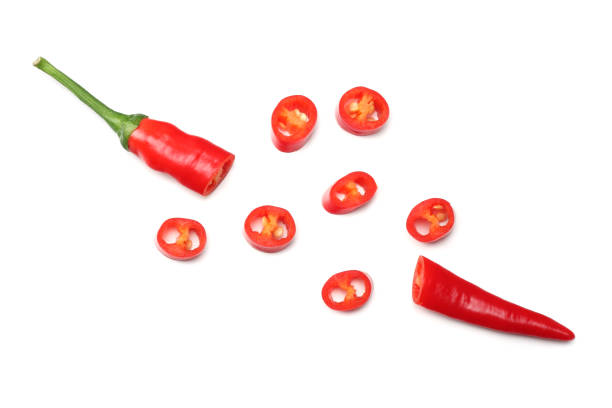 istock sliced red hot chili peppers isolated on white background top view 924500168