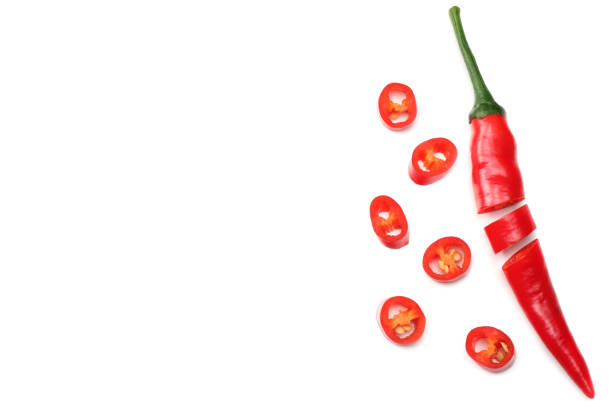 istock sliced red hot chili peppers isolated on white background top view 924500170