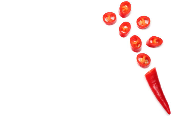 istock sliced red hot chili peppers isolated on white background top view 924500172