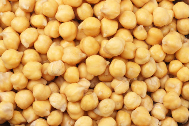 istock healthy food. chickpeas background. chickpeas texture. macro. top view 924501260