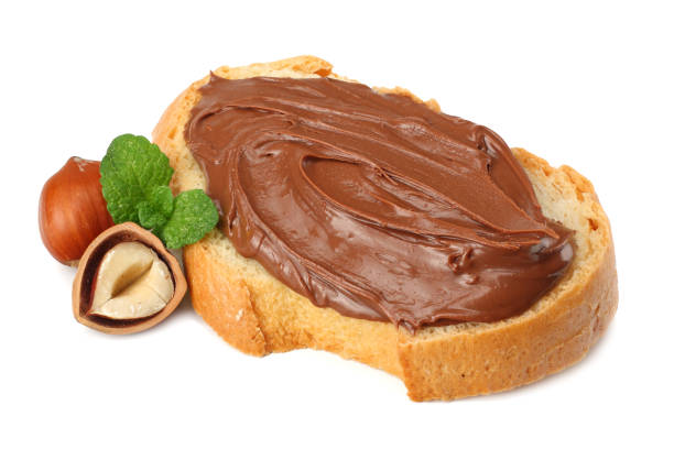 istock Slice of bread with chocolate cream with hazelnut isolated on white background 924504554