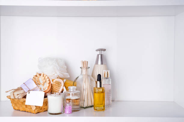 istock Various spa and beauty threatment products on white shelf 924505066