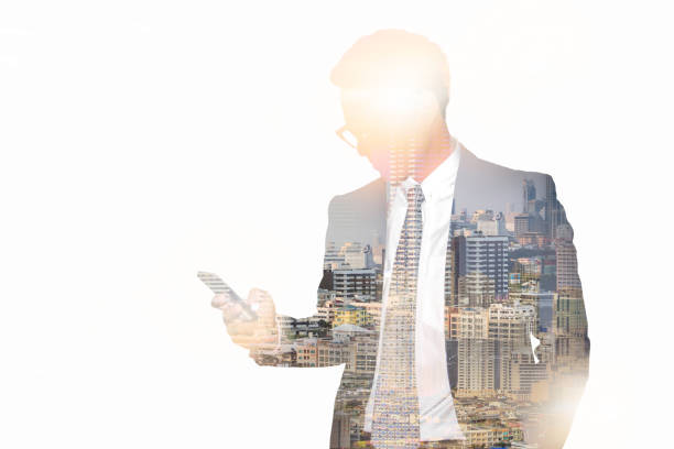 istock Double exposure of businessman using the smartphone with cityscape, Communication network and technology for business concept 924512396