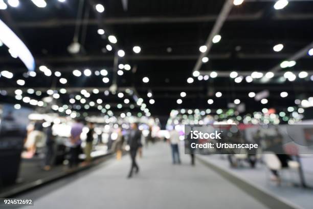 Blurred Defocused Background Of Public Exhibition Hall Business Tradeshow Or Stock Market Organization Or Company Event Commercial Trading Fair Or Shopping Mall Marketing Advertisement Concept Stock Photo - Download Image Now