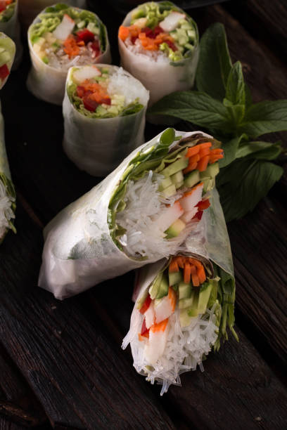 istock Delicious vietnamese spring roll with vegetable on dark background ,healthy food 924513740