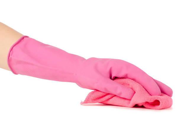 istock Hand in glove for cleaning a  microfiber 924515800