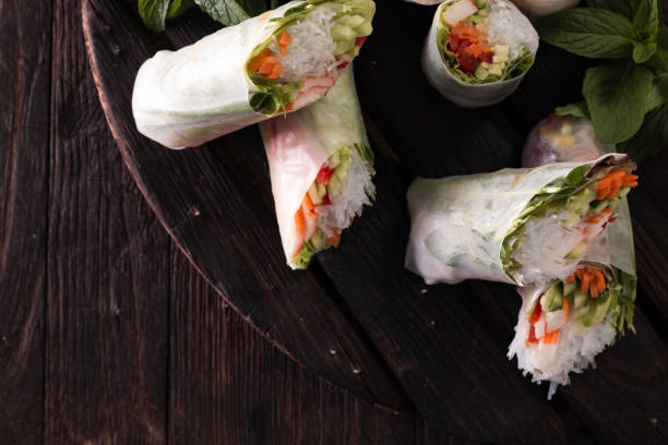 istock Delicious vietnamese spring roll with vegetable on dark background ,healthy food 924516634