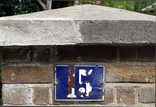 istock Old Number 15 House Sign on Pillar 92451951