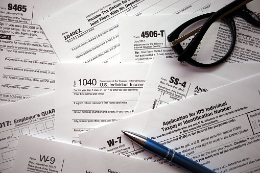 US tax forms background. Financial or business concept