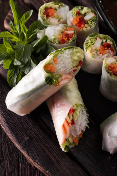 istock Delicious vietnamese spring roll with vegetable on dark background ,healthy food 924520738